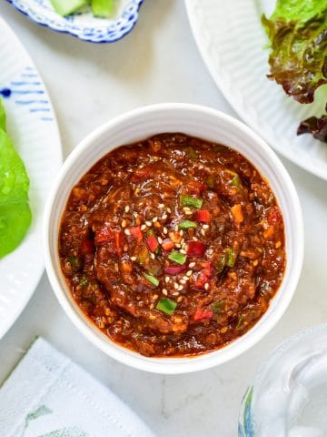 overhead shot of Sauce for Korean lettuce wraps in a small white ball