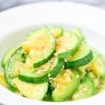 Korean Stir-fried zucchini slices in a white bowl