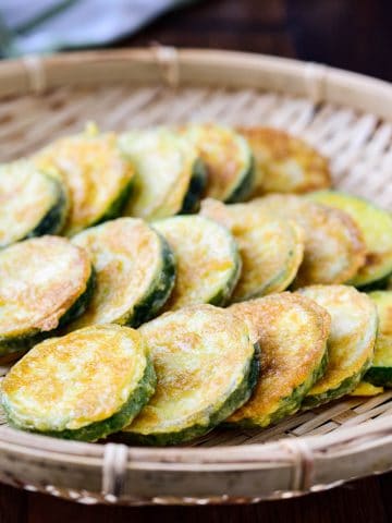 Korean zucchini fritter in a shallow bamboo basket