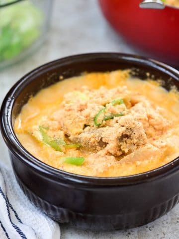 Korean stew made with soybean puree, pork ribs, and kimchi in an earthenware